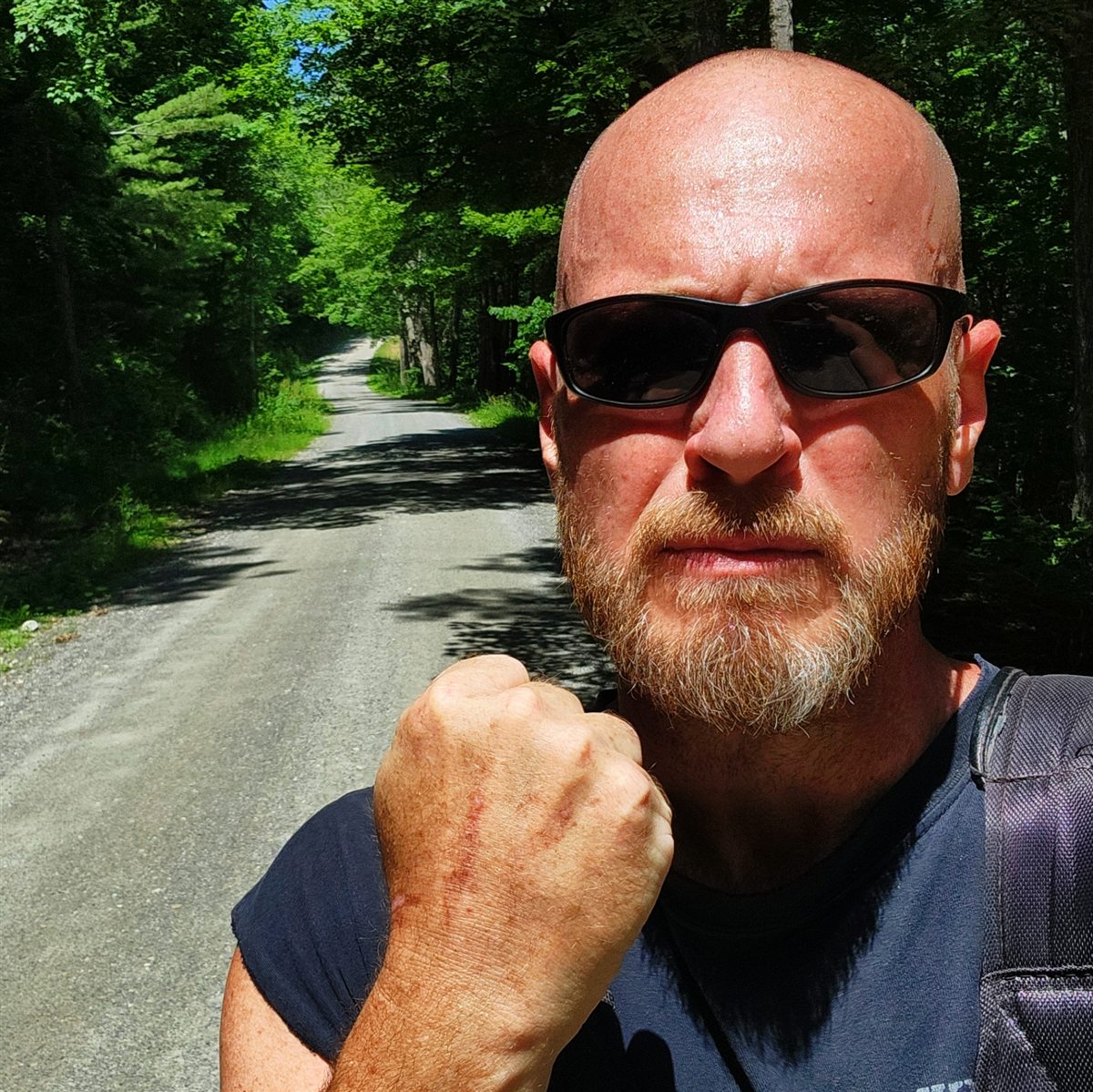 Rob on a dirt road during a Rebooting Rob walk